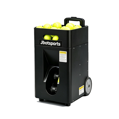 Black Jbotsports portable tennis ball throwing machine on white background, built-in carry handle and rolling wheels for easy transport, large capacity ball hopper filled with yellow tennis balls, automatic solo tennis practice training equipment for home court