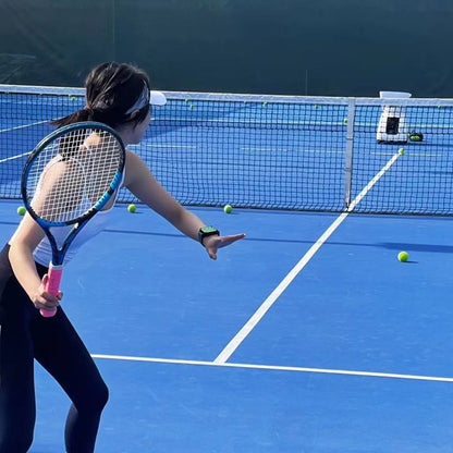 Tennis Player Training with Smart Watch & Ball Machine - Court Practice Using Automatic Tennis Feeder